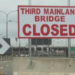 The Federal Government has announced the planned closure of the Iyana Oworonshoki-Adeniji Adele section of the Third Mainland Bridge in 2024. The Federal Controller of Works, Lagos State, Mrs Olukorede Kesha, announced in a Thursday statement that the planned closure will commence from 11: 00 am on Tuesday, Jan. 9, 2024. Kesha said the closure would be done on the Lagos Island-bound carriageway of the bridge. She appealed to motorists to obey traffic rules and use alternative routes to prevent hardship as comprehensive repairs continue on the highway. “The Federal Government through the Federal Ministry of Works wishes to inform the motoring public that the emergency repairs of Third Mainland Bridge in Lagos will continue with the closure of Iyana Oworonshoki-Adeniji Adele bound for the effective repairs of the entire section of the bridge. “Consequent upon the above, motorists are hereby advised to use alternative routes,” she said. Kesha identified the alternative routes and links to include: Ojota-Ikorodu Road-Funsho Williams Avenue-Eko Bridge-Apogbon-CMS and Ojota-Ikorodu Road-Jibowu-Yaba-Oyingbo-Iddo-Carter Bridge-CMS. Also listed was Gbagada-Anthony-Ikorodu Road-Funsho Williams-Eko Bridge-Apogbon-CMS. “Motorists are further advised to cooperate with the traffic management officials deployed to manage traffic and ensure hitch-free movements to minimise discomfort during this repair period. “While thanking the general public for their past cooperation and understanding, more is expected this time,” she added. The 11.8 km Third Mainland Bridge undergoing comprehensive rehabilitation is the longest of three bridges connecting Lagos Island to the Mainland.